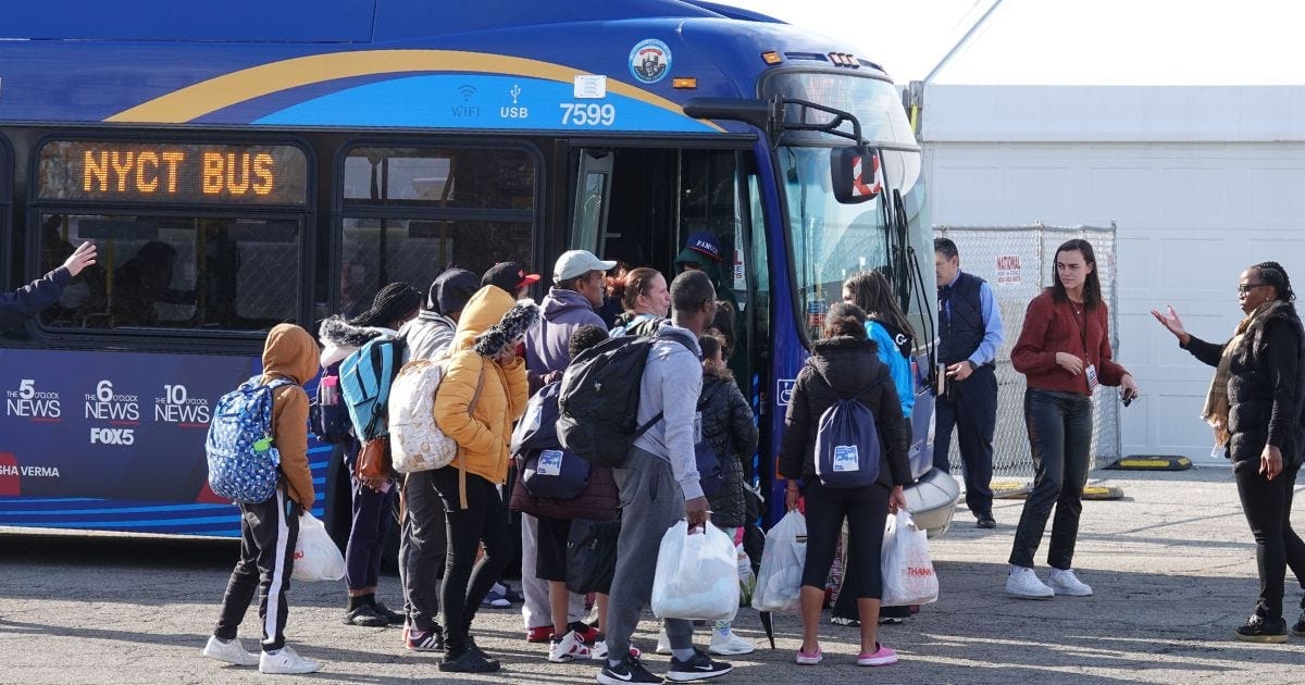 Illegal immigrants arrive at Floyd Bennett Field in Brooklyn, New York, on Sunday. Illegal immigrants arrive at Floyd Bennett Field in Brooklyn, New York, on Sunday.