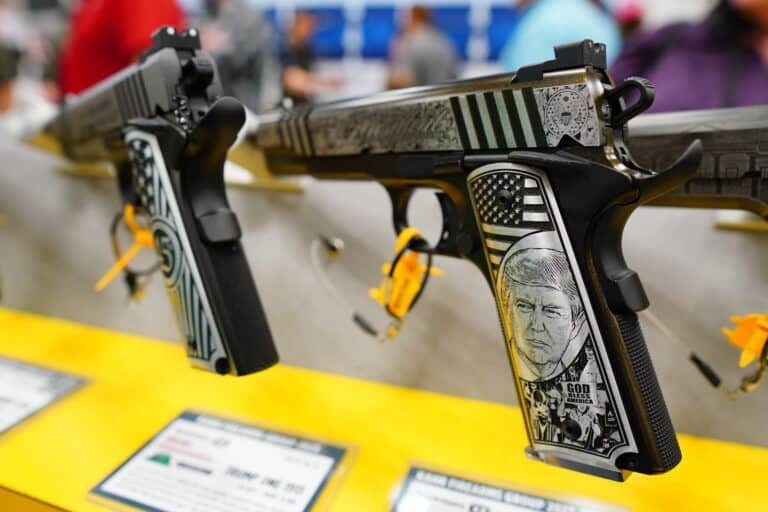 A pistol with former president Donald Trump's face engraved in it on display at the 2023 NRA Annual Meeting A pistol with former president Donald Trump's face engraved in it on display at the 2023 NRA Annual Meeting