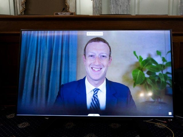 Mark Zuckerberg Smiles during testimony (Pool/Getty) Mark Zuckerberg Smiles during testimony (Pool/Getty)