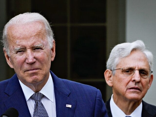 WASHINGTON, DC - MAY 13: Attorney General Merrick Garland looks on as U.S. President Joe B WASHINGTON, DC - MAY 13: Attorney General Merrick Garland looks on as U.S. President Joe B