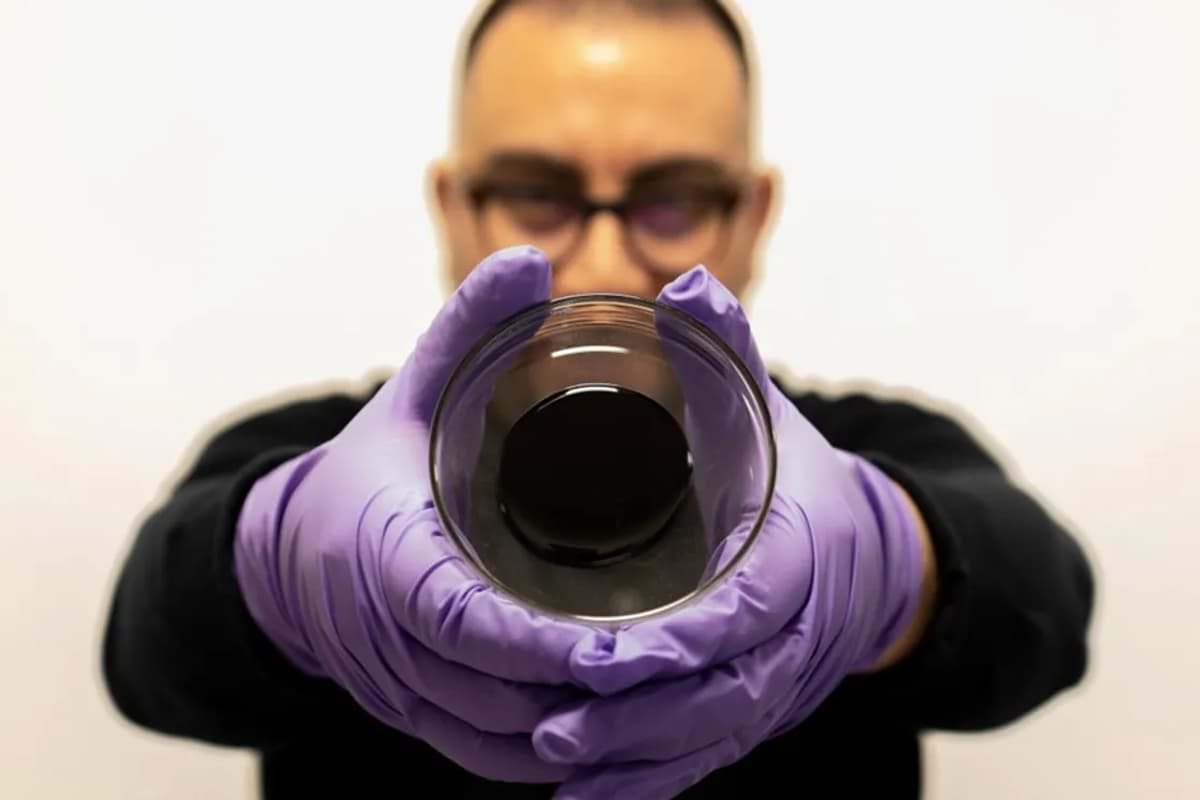 Swansea University's Dr. Jose Norambuena-Contreras with a sample of the self-healing asphalt Swansea University's Dr. Jose Norambuena-Contreras with a sample of the self-healing asphalt