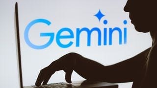 The silhouette of a man in front of the Gemini logo The silhouette of a man in front of the Gemini logo