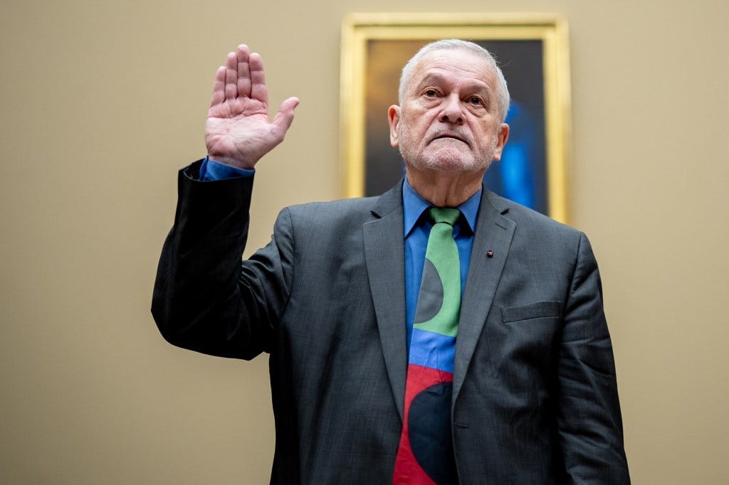 Dr. David Morens being sworn in at a House Select Subcommittee on the Coronavirus Pandemic hearing at Capitol Hill, raising his hand Dr. David Morens being sworn in at a House Select Subcommittee on the Coronavirus Pandemic hearing at Capitol Hill, raising his hand