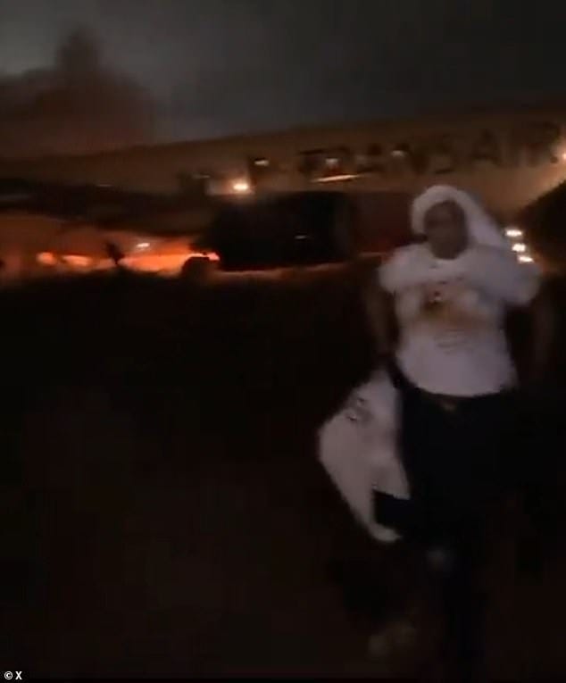 Shocking footage emerged of the moment terrified passengers fled a burning Boeing jet that skidded off the runway and caught fire in Senegal early this morning Shocking footage emerged of the moment terrified passengers fled a burning Boeing jet that skidded off the runway and caught fire in Senegal early this morning
