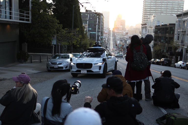 Robot taxi riders in San Francisco targeted with a new form of harassment Robot taxi riders in San Francisco targeted with a new form of harassment