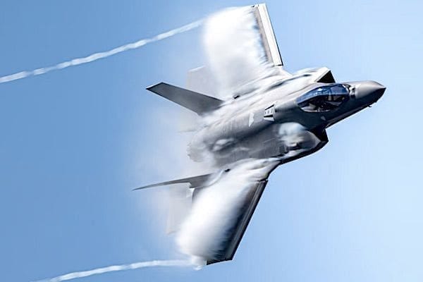 Air Force Maj. Kristin 'BEO' Wolfe flies an F-35A Lightning II while performing a dedication pass during an air show over Kleine Brogel Air Base, Belgium, Sept. 8, 2023. (U.S. Air Force photo by Staff Sgt. Thomas Barley) Air Force Maj. Kristin 'BEO' Wolfe flies an F-35A Lightning II while performing a dedication pass during an air show over Kleine Brogel Air Base, Belgium, Sept. 8, 2023. (U.S. Air Force photo by Staff Sgt. Thomas Barley)
