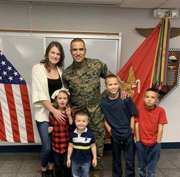Newly promoted Gunnery Sgt. Logan Sowell stands for a photo with his wife, Tatiana, and children, from left, Brooklynn, Julian, Jayden and Jackson, at the Marine Corps Air Station Beaufort in South Carolina. (Courtesy Tatiana Sowell) Newly promoted Gunnery Sgt. Logan Sowell stands for a photo with his family