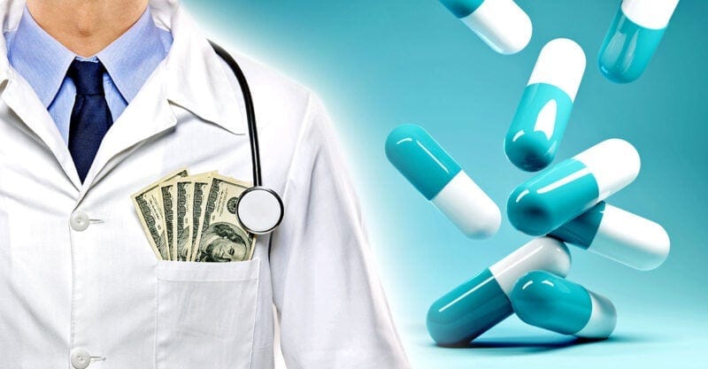 doctor with money in pocket and pills doctor with money in pocket and pills