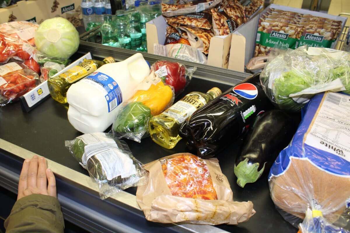 groceries on a checkout line groceries on a checkout line