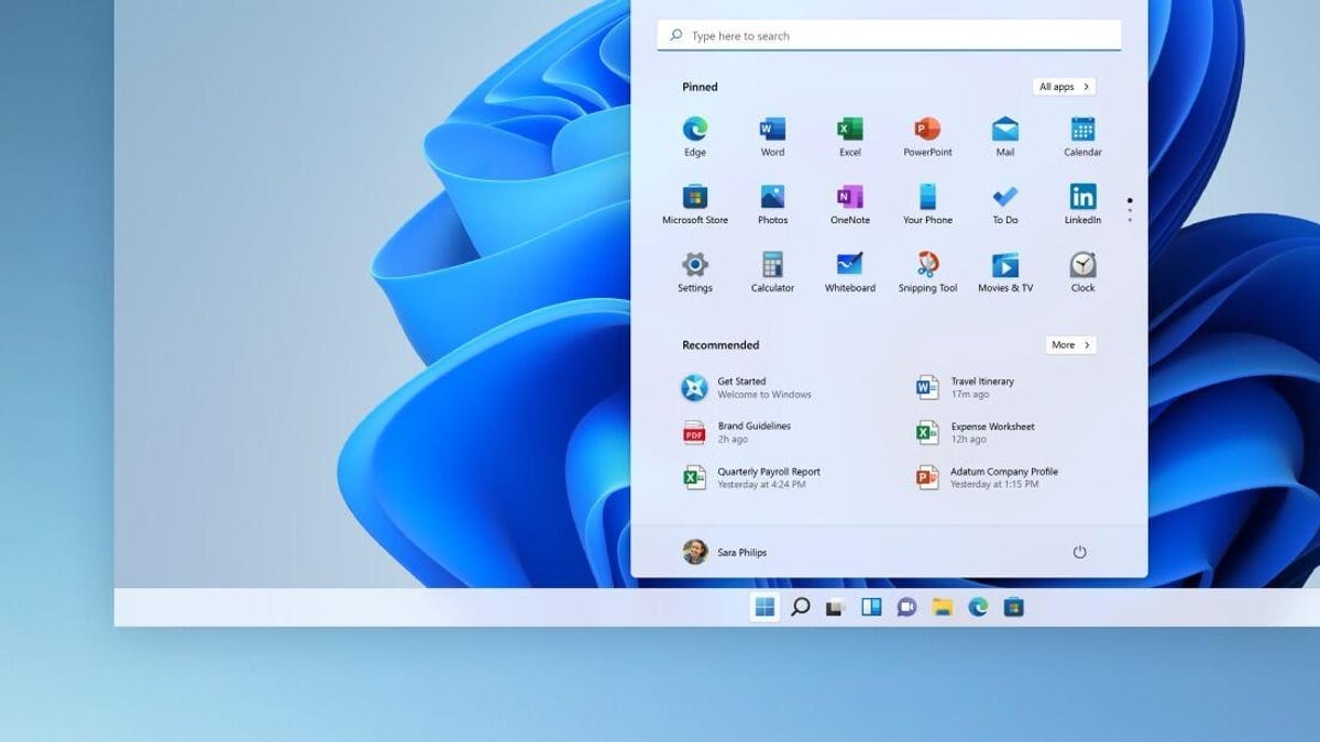 a screenshot of the Windows 11 Start menu popped up on an abstract blue background a screenshot of the Windows 11 Start menu popped up on an abstract blue background