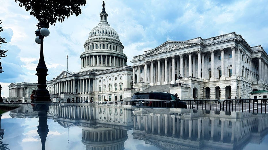 The U.S. Capitol's reflection after a rain storm. The U.S. Capitol's reflection after a rain storm.