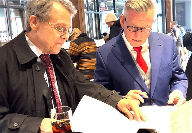 Jacob Hornberger and Mark Edge carefully review Ian Freeman's appeal brief, discussing the complexities of the tax evasion charges and allegations of unlicensed money transfer. Jacob Hornberger and Mark Edge carefully review Ian Freeman's appeal brief, discussing the complexities of the tax evasion charges and allegations of unlicensed money transfer.