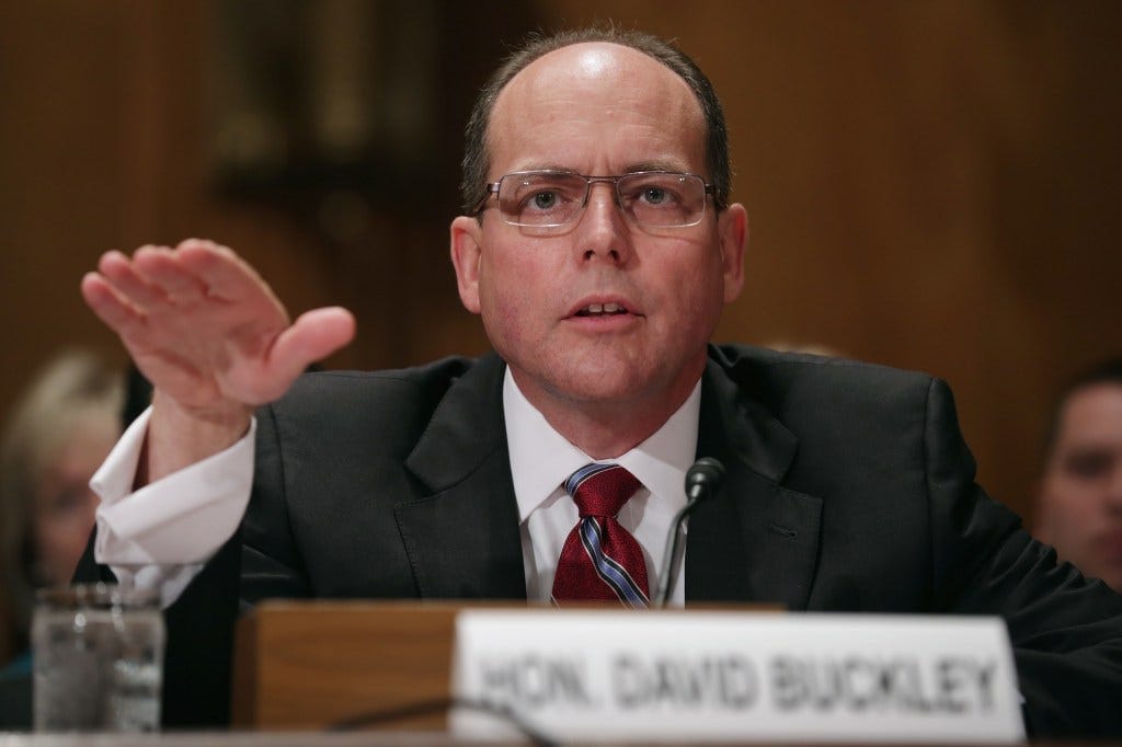 Former CIA inspector general David Buckley was also a CIA contractor at the time. Former CIA inspector general David Buckley was also a CIA contractor at the time.