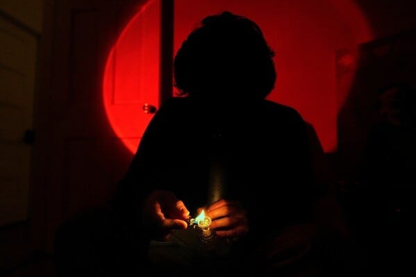 Kyle, a college student, smokes cannabis out of a bong, Oct. 29, 2025, in Boston. (AP Photo/Robert F. Bukaty) Kyle, a college student, smokes cannabis out of a bong, Oct. 29, 2025, in Boston. (AP Photo/Robert F. Bukaty)
