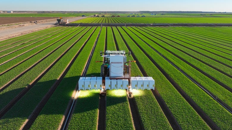 A Laserweeder robot does its job on a field A Laserweeder robot does its job on a field