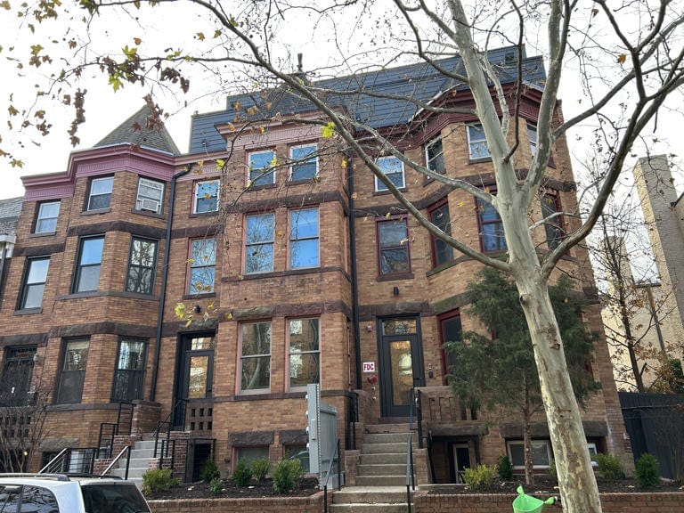 Two adjacent rowhouses on Chapin Street NW were combined and renovated to form the first Cohabs building in D.C. There is no signage to suggest that the building is different from the other houses on the block. (Photo by Aaron Wiener/The Washington Post) Two adjacent rowhouses on Chapin Street NW were combined and renovated to form the first Cohabs building in D.C. There is no signage to suggest that the building is different from the other houses on the block. (Photo by Aaron Wiener/The Washington Post)