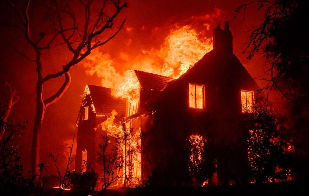 A house burning in the fire wildfires A house burning in the fire wildfires