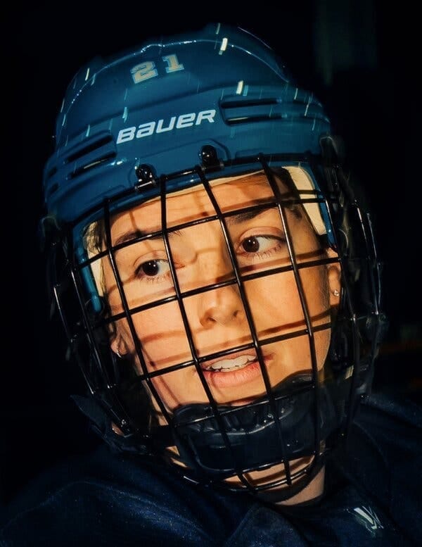 A close-up of Hilary Knight in her hockey mask. A close-up of Hilary Knight in her hockey mask.
