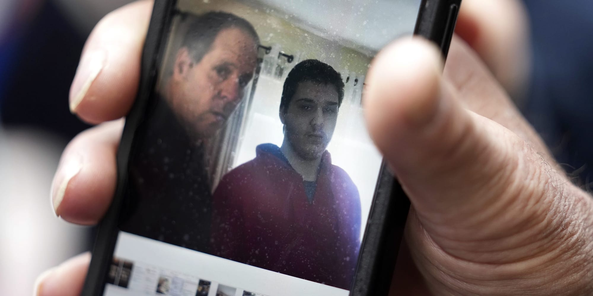 Paul Ventura, father of 18-year-old Mateo Ventura, both of Wakefield, Mass., displays a photograph on his cell phone that shows what he describes as a photo of himself and his son Mateo, right, while speaking with reporters outside federal court, Thursday, June 8, 2023, in Worcester, Mass. Mateo Ventura appeared in federal court Thursday on a charge of knowingly concealing the source of material support or resources to a foreign terrorist organization, the U.S. attorney's office in Boston said in a statement. (AP Photo/Steven Senne) Paul Ventura, father of 18-year-old Mateo Ventura, both of Wakefield, Mass., displays a photograph on his cell phone that shows what he describes as a photo of himself and his son Mateo, right, while speaking with reporters outside federal court, Thursday, June 8, 2023, in Worcester, Mass. Mateo Ventura appeared in federal court Thursday on a charge of knowingly concealing the source of material support or resources to a foreign terrorist organization, the U.S. attorney's office in Boston said in a statement. (AP Photo/Steven Senne)