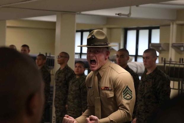 Recruits with Echo Company, 2nd Recruit Training Battalion, are introduced to their drill instructors, including Staff. Sgt. Courtland Bates Wind, at Parris Island on March 13, 2023 (Lance Cpl. Bradley Williams/Marine Corp Recruit Depot, Parris Island) Recruits are introduced to their drill instructors
