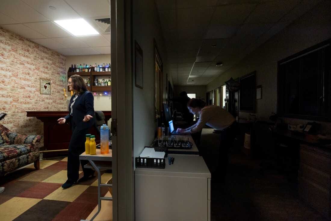 Photos of Jane Metrik and members of her lab working in the Bar Lab measuring alcoholic drinks and weighing cannabis. Photos of Jane Metrik and members of her lab working in the Bar Lab measuring alcoholic drinks and weighing cannabis.