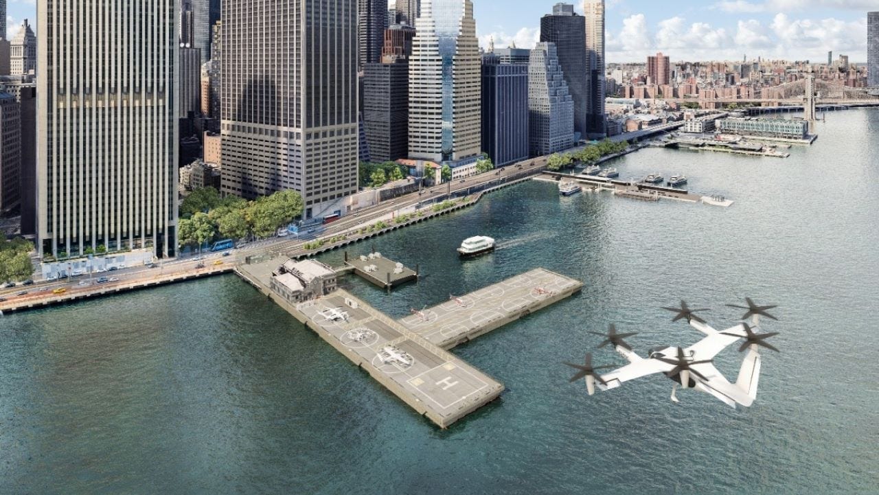 Aeriel view of a flying vehicle coming in above the new vertiport in New York City. Aeriel view of a flying vehicle coming in above the new vertiport in New York City.