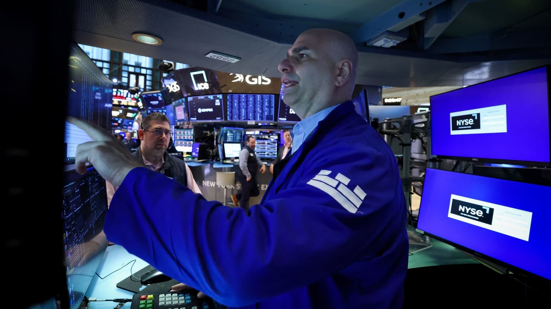 Traders work on the floor at the New York Stock Exchange (NYSE) in New York City, U.S., March 18, 2026. REUTERS/Brendan McDermid Traders work on the floor at the New York Stock Exchange (NYSE) in New York City, U.S., March 18, 2026. REUTERS/Brendan McDermid
