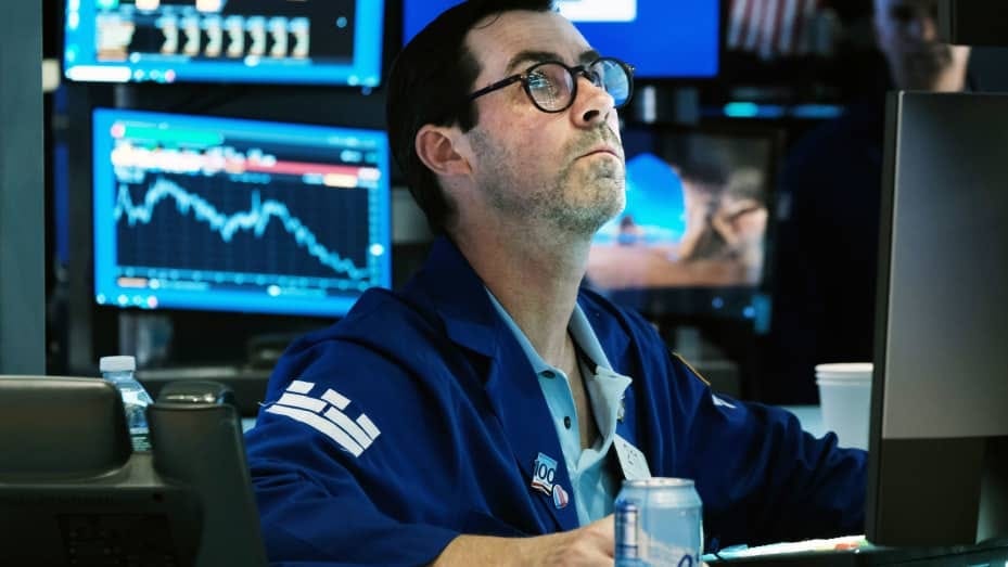 Traders work on the floor of the New York Stock Exchange (NYSE) on August 26, 2022 in New York City.