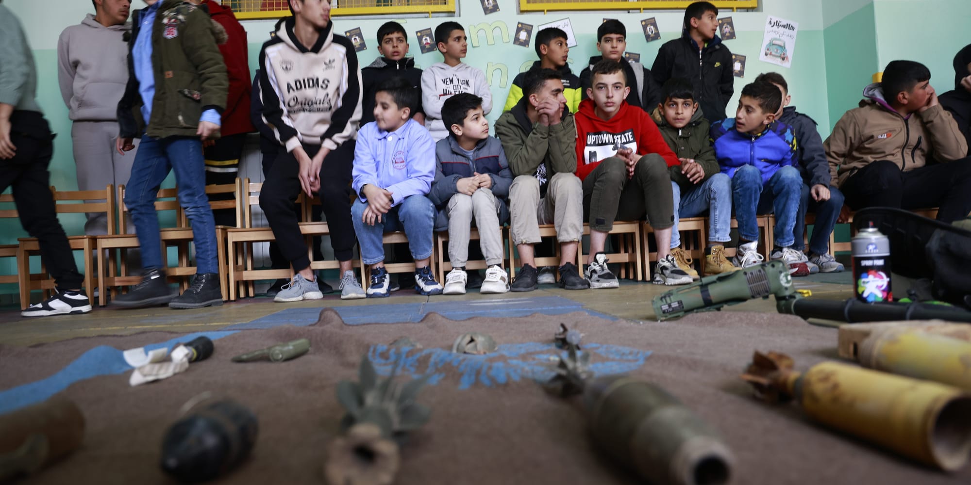 SHEBAA, LEBANON - JANUARY 21: Numerous students participate in a mine risk education event to raise awareness about the ongoing threat of landmines and unexploded ordnance left from past conflicts in Shebaa, Lebanon on January 21, 2026. Supported by the United Nations, these initiatives focus on clearing contaminated areas in southern Lebanon and educating civilians, especially children, about the dangers of remnants of war that continue to endanger local communities. The awareness session aims to reduce risks through interactive training, teaching participants how to recognize suspicious objects, avoid high-risk zones, and report potential hazards to authorities. (Photo by Ramiz Dallah/Anadolu via Getty Images) SHEBAA, LEBANON - JANUARY 21: Numerous students participate in a mine risk education event to raise awareness about the ongoing threat of landmines and unexploded ordnance left from past conflicts in Shebaa, Lebanon on January 21, 2026. Supported by the United Nations, these initiatives focus on clearing contaminated areas in southern Lebanon and educating civilians, especially children, about the dangers of remnants of war that continue to endanger local communities. The awareness session aims to reduce risks through interactive training, teaching participants how to recognize suspicious objects, avoid high-risk zones, and report potential hazards to authorities. (Photo by Ramiz Dallah/Anadolu via Getty Images)
