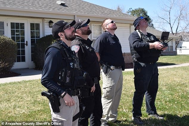 The Arapahoe County Sheriff¿s Office, based in Centennial, Colorado, has been using the robotic flying devices since 2017. (pictured: officers testing out a drone) The Arapahoe County Sheriff¿s Office, based in Centennial, Colorado, has been using the robotic flying devices since 2017. (pictured: officers testing out a drone)
