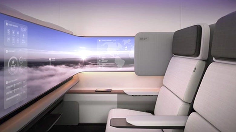 Inside of a commercial JetZero with seats and a screen Inside of a commercial JetZero with seats and a screen