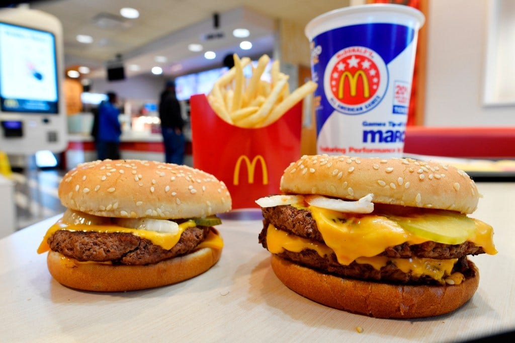 McDonald's Quarter Pounder and Double Quarter Pounder burgers with fresh beef on a table in Atlanta McDonald's Quarter Pounder and Double Quarter Pounder burgers with fresh beef on a table in Atlanta